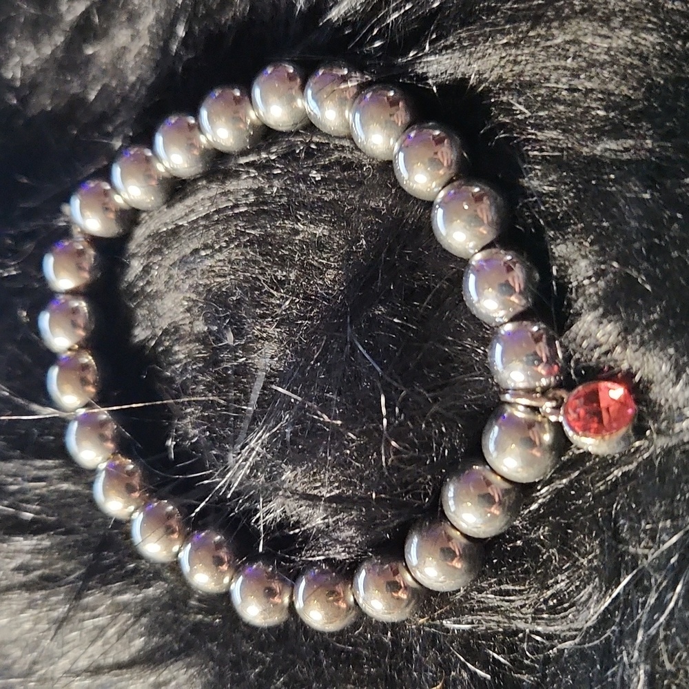 By Krafty_Korner Hand crafted beaded bracelet made on a stretchy cord